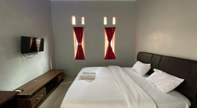 Djaboerigin Mongonsidi Guest House RedPartner, Rezerwuj Pensjonat Medan Sumatra