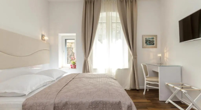 Номер Deluxe Pellegrini Luxury Rooms