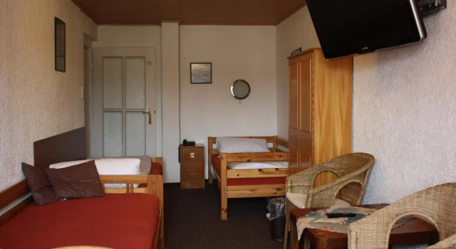 Четырёхместный номер Hotel Pension Schmellergarten