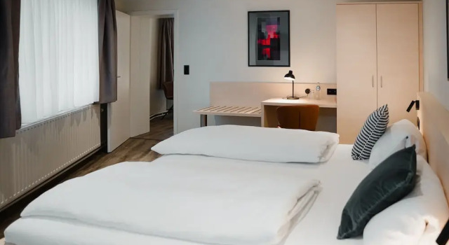 Четырёхместный семейный номер Standard с 2 комнатами Hotel Restaurant Tychon AG