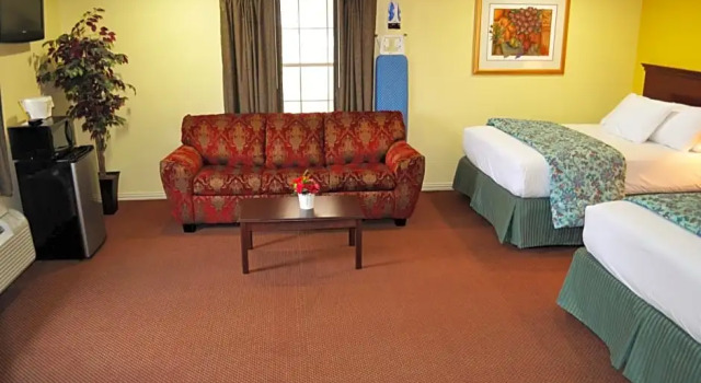Полулюкс Executive Inn & Suites Magnolia