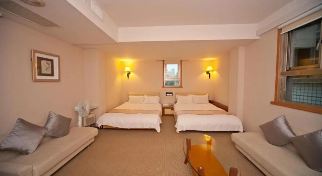 Четырёхместный номер Standard Tian Long Hotel