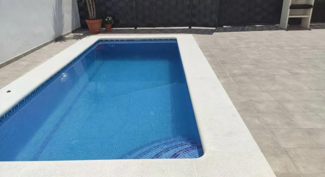 Коттедж с 4 комнатами Apartamentos NayDa Gran casa con piscina