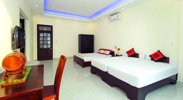 Кровать в общем номере Royal Homestay