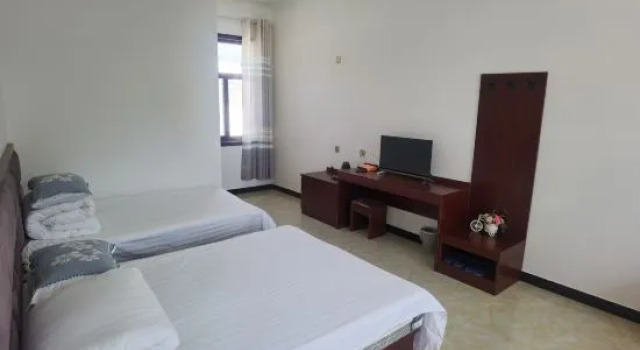 Kρεβάτι σε υπνωτήριο Green Source Homestay