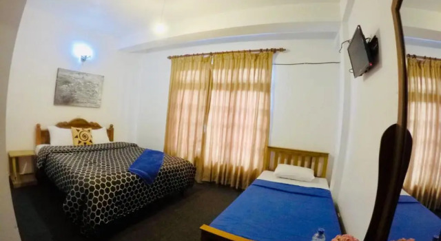 Четырёхместный номер Standard New Royal Mount Hotel