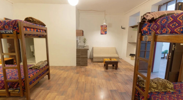 Кровать в общем номере Imaynalla Hostel