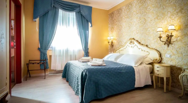 Апартаменты B&B La Bauta
