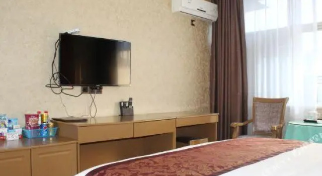 Kai Di Business Hotel, Prenota Hotel Guangyuan Sichuan