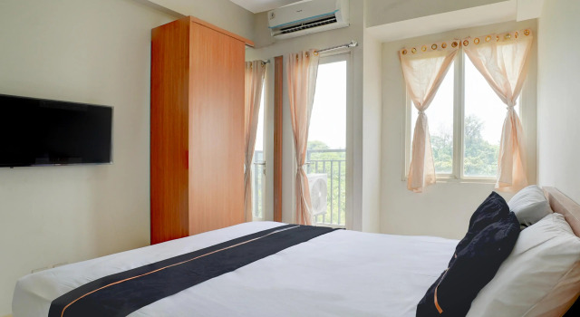 Suite OYO 94837 Apartment Ekki Tower