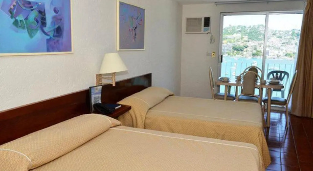 Четырёхместный номер Standard с видом на океан Alba Suites Acapulco