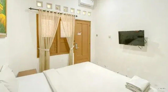 Номер Standard Hotel Maerakaca Tugu Yogyakarta Mitra RedDoorz