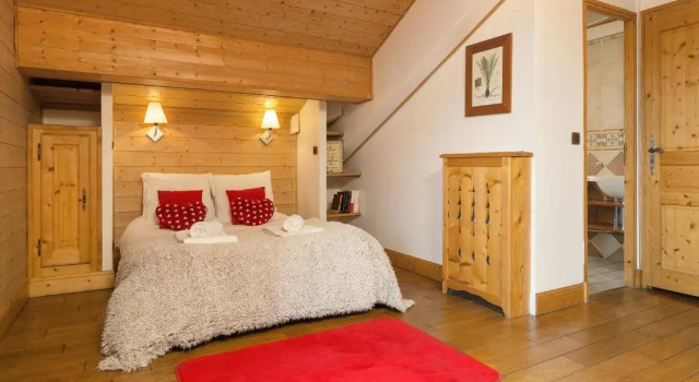 Кровать в общем номере Madame Vacances Les Chalets de l'Altiport