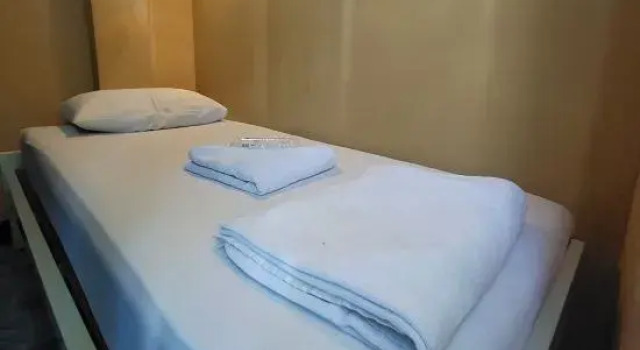 Кровать в общем номере My Hotel Pratunam