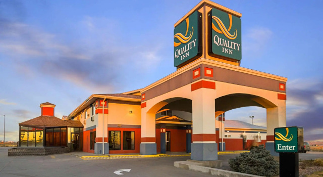 Кровать в общем номере Quality Inn Sidney I-80