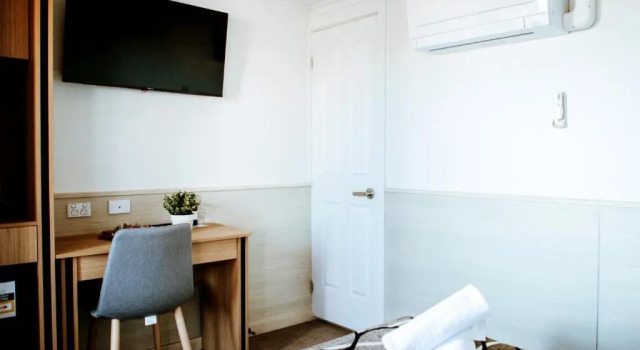 Номер Executive Astor Inn