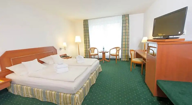 Номер Comfort Maifeld Sport- und Tagungshotel