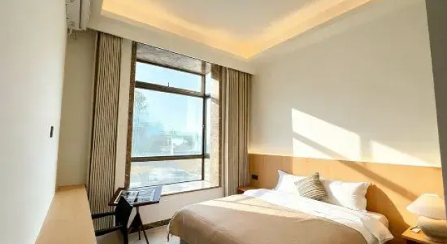 Кровать в общем номере с 6 комнатами Suzaojia Scenic Apartment