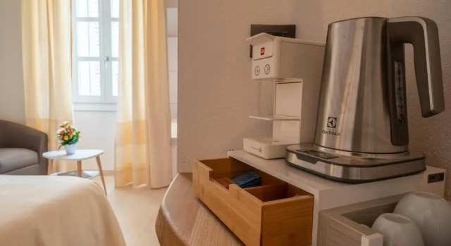 Номер Deluxe Corso Umberto Rooms