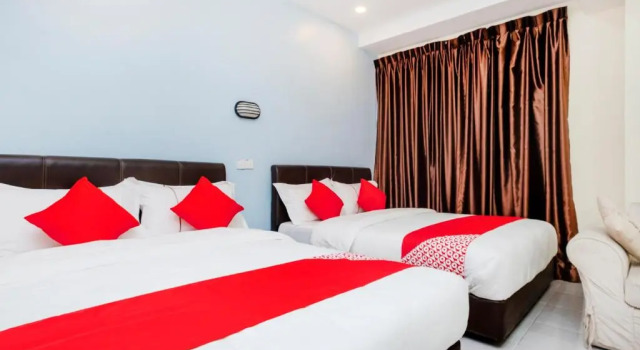 Семейный люкс OYO 494 EG Hotel