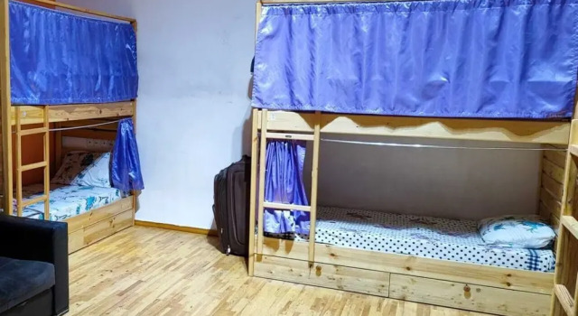 Кровать в общем номере Sea Side