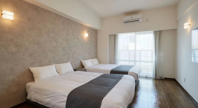 Номер Deluxe New Normal Hotel in NAMINOUE ニューノーマルホテルイン波の上