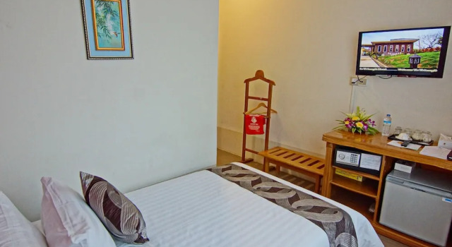Номер Economy Triumph Hotel