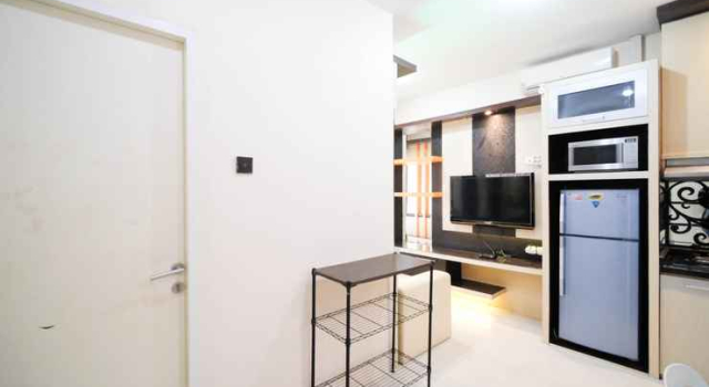 Homey and Best Location 2BR at Twin Tower Apartment By Travelio