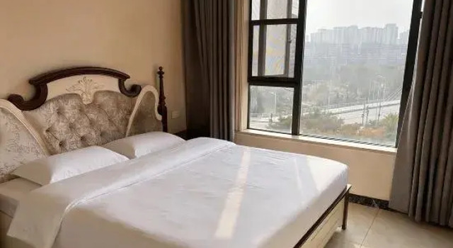 Кровать в общем номере Kelejia Homestay