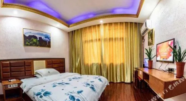 Wulingyuan Jiajia Business Hotel, Забронировать Отель Чжанцзяцзе Хунань