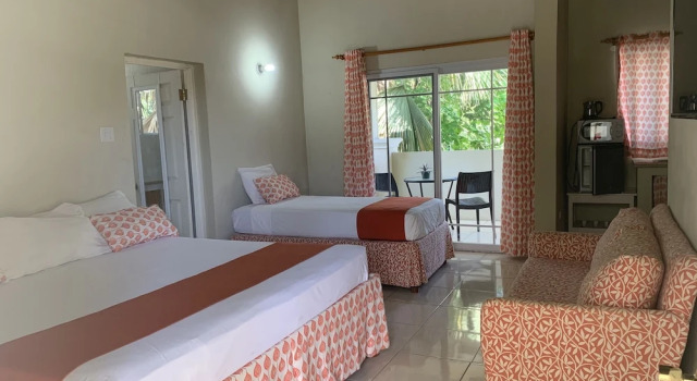 King Suite at Oceanview Resort in Jamaica - Enjoy 7 Miles Of White Sand Beach! 1 Bedroom Villa by RedAwning