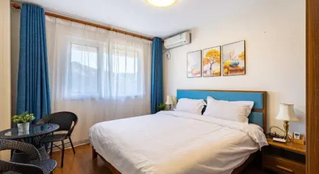 Семейный люкс с 2 комнатами с балконом Aiyiyi Leisure Holiday Apartment