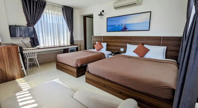 Трёхместный семейный номер Standard Tuan Ninh Hotel