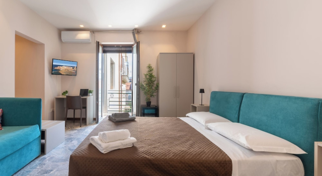 Четырёхместный номер Standard с балконом и с видом на внутренний двор Suebi Central - Deluxe Rooms & Family Suites