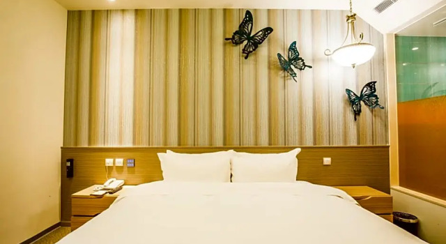 O podwyższonym standardzie pokój Walker Hotel Ximen
