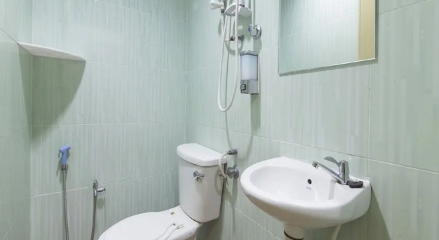 Номер Deluxe OYO 44072 Mines Cempaka Hotel