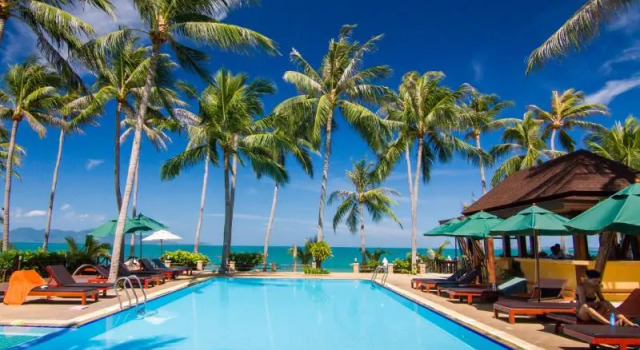 Кровать в общем номере Coco Palm Beach Resort - SHA Extra Plus