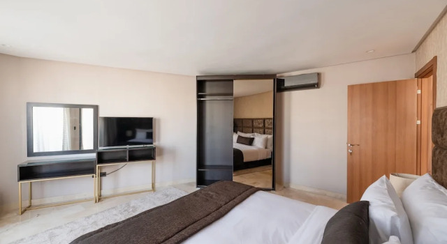 Люкс Deluxe с балконом Avenue Suites & Appart hôtel Deluxe