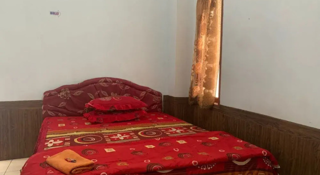 OYO 91263 Dinar Homestay, Prenota Hotel Hotel a Sulawesi con parcheggio, Parcheggio