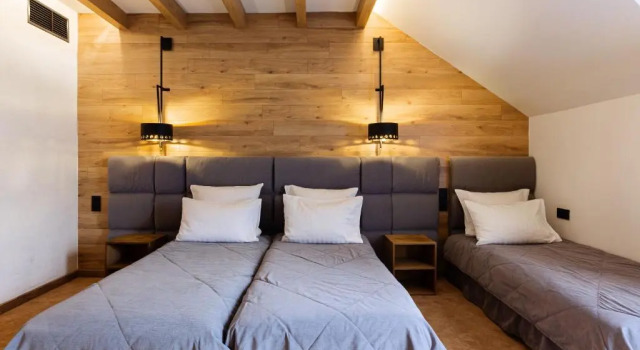Трёхместный полулюкс Bukovel Hotel