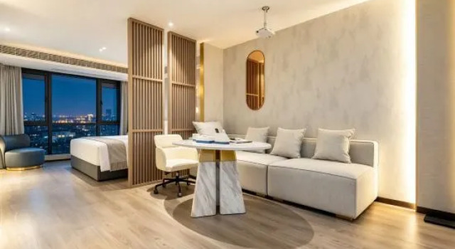 Люкс Classic Kuanrong Suites Hotel (Liangjiang love sea shopping park)