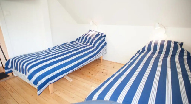 Кровать в общем номере Lagunen Cottages and Hostel