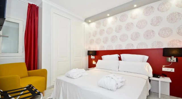 Апартаменты The Zentral Arenal Suites