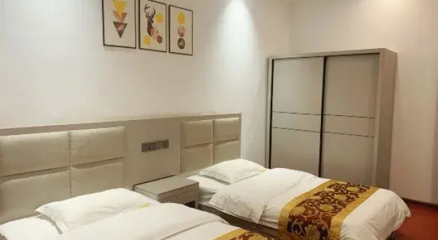 Люкс Deluxe Mengla Yishang Business Hotel