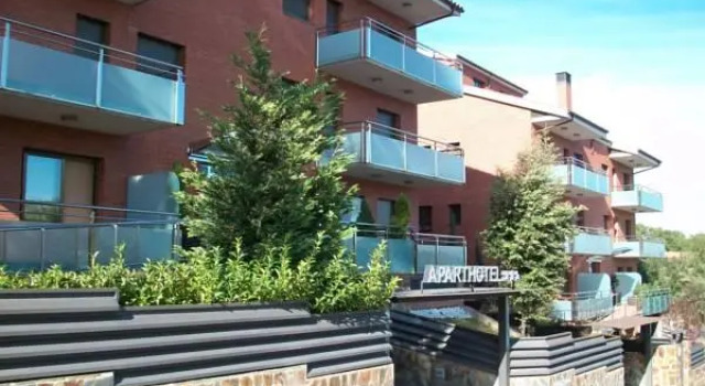Кровать в общем номере с 2 комнатами Aparthotel del Golf