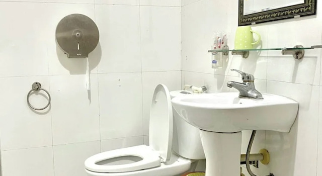 Кровать в общем номере Tuan Ngoc Hotel