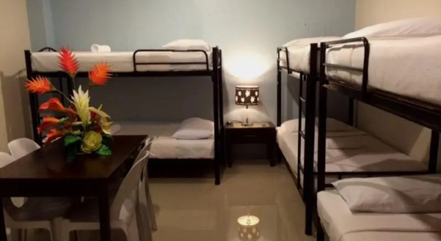 Кровать в общем номере Urban Manor Hotel Annex