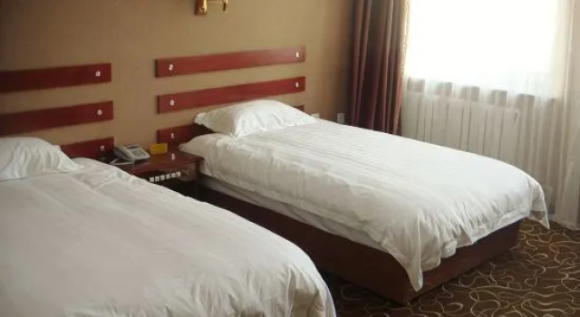 Четырёхместный люкс Jinlu Business Hotel (Heihe Riverside)