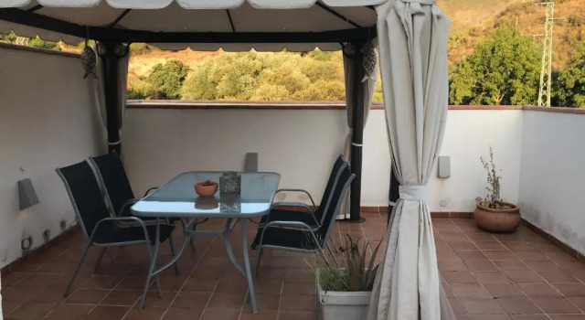 Апартаменты Apartamento junto al río en entrada ruta Cahorros
