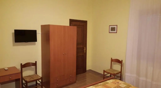 Camera quadrupla Standard con vista sul giardino Villa Erry